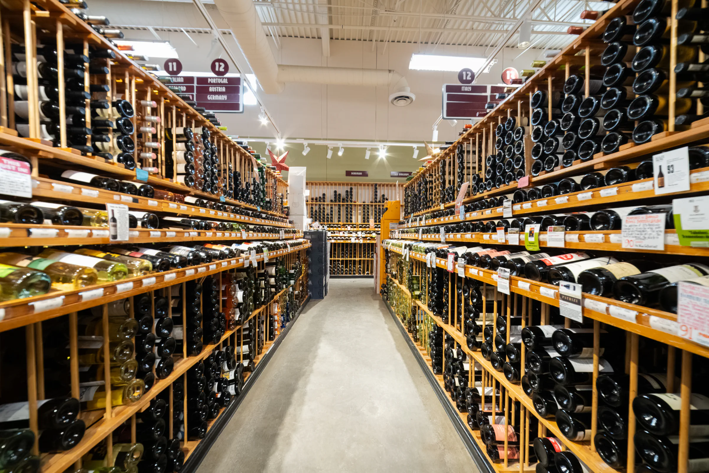 Wine racks lining a store aisle